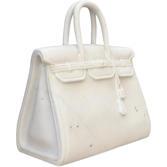 The Princess by Currey and Company in white. Made from marble in a modern style.