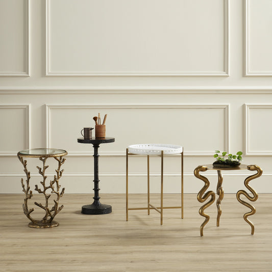 Serpent Accent Table by Currey and Company in antique brass. Made from cast aluminum in a modern style.