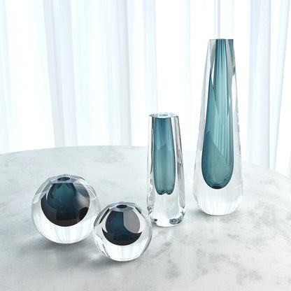 Square Cut Glass Vase by Global Views. Made from art glass in a coastal style.