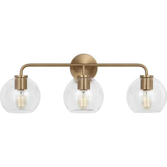 Orley Three Light Vanity by Visual Comfort & Co. in satin brass. Made from steel in a unique style.