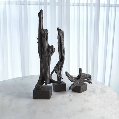 Iron Driftwood Sculpture by Global Views. Made from cast iron, marble in a eclectic & global style.