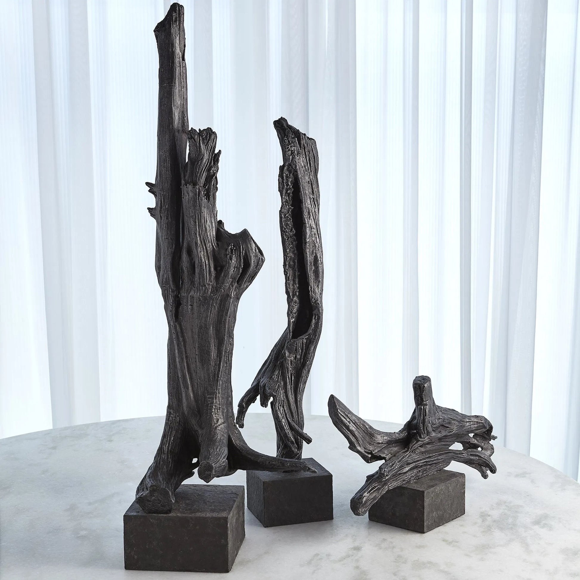 Iron Driftwood Sculpture by Global Views. Made from cast iron, marble in a eclectic & global style.