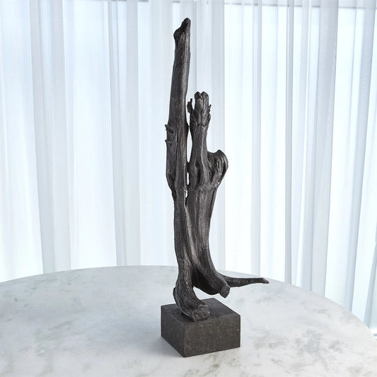 Iron Driftwood Sculpture by Global Views. Made from cast iron, marble in a eclectic & global style.