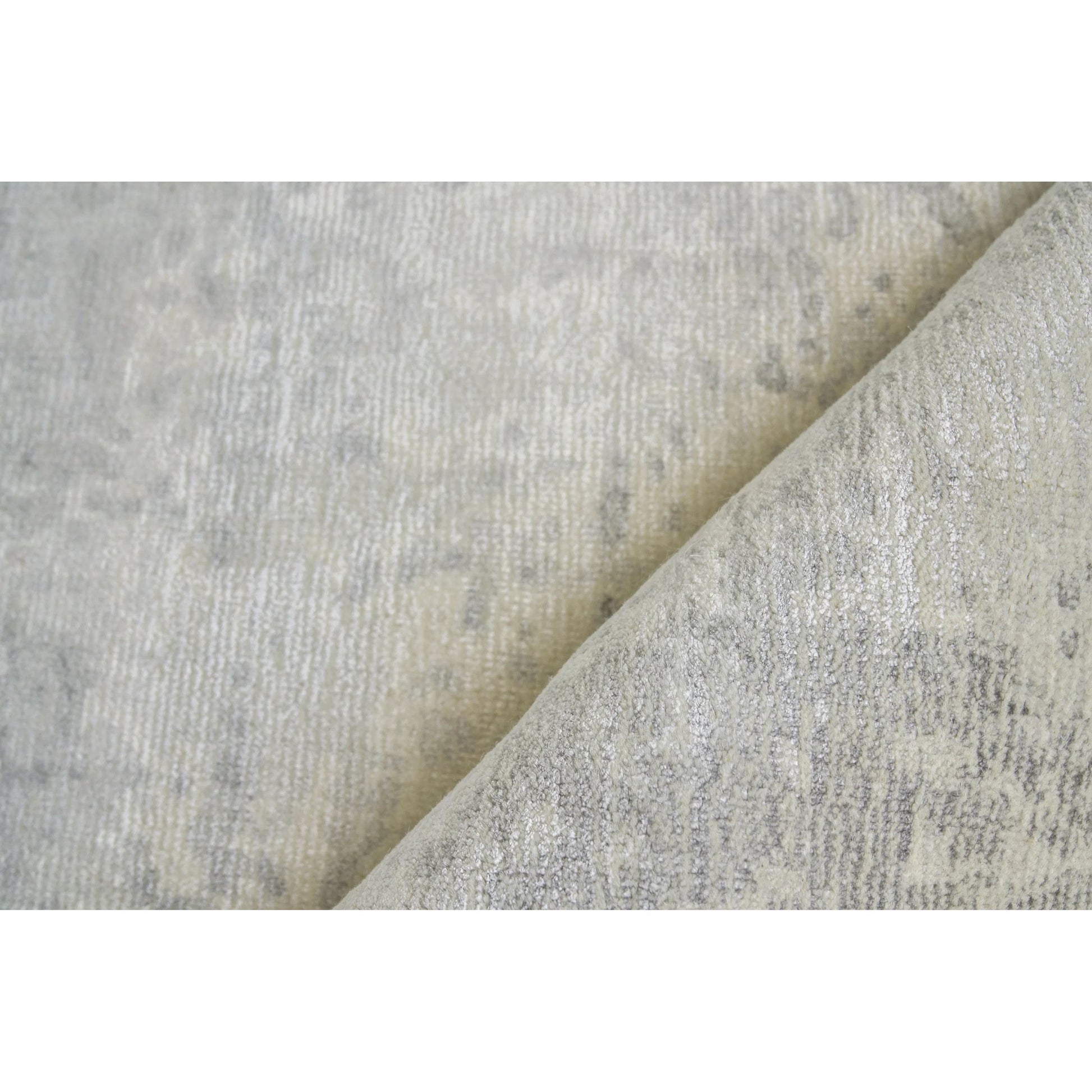 Murano Rug by Exquisite Rugs in metallic. Made from wool, bamboo silk in a unique style.