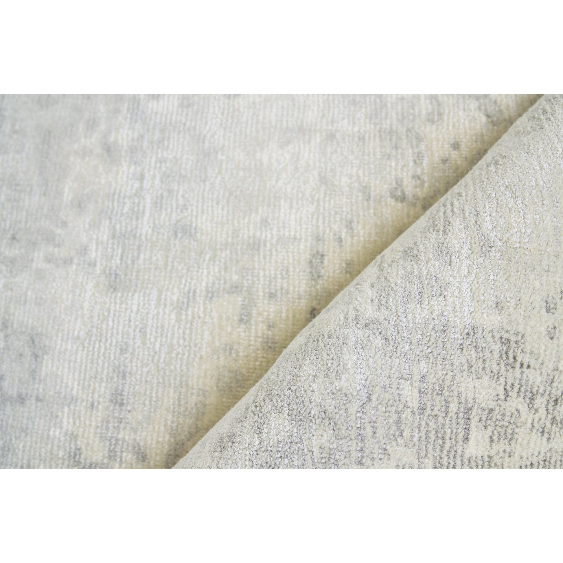 Murano Rug by Exquisite Rugs in metallic. Made from wool, bamboo silk in a unique style.
