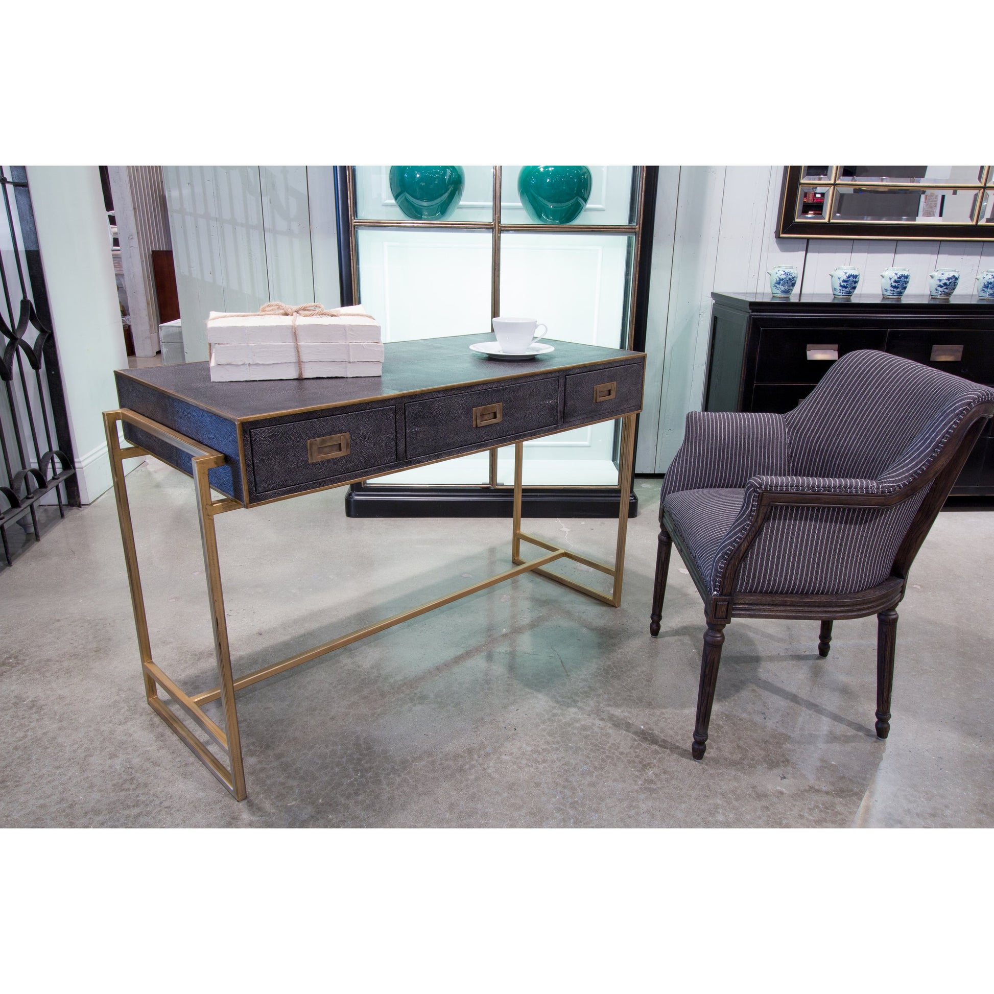 Grey Leather Shagreen Desk by Sarreid Ltd. in gray and 3 drawers w/marbleized paper. Made from leather, marble, iron in a transitional style.