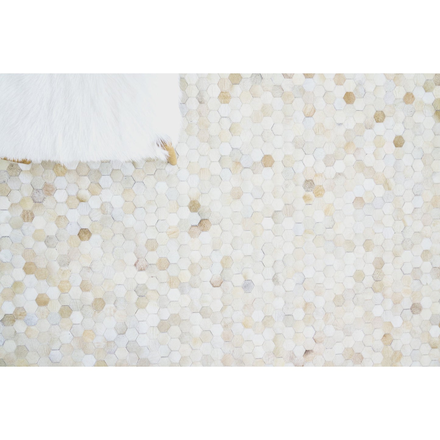 006 SI-1828885,SI-1828887 | Lifestyle | Mosaic Leather 4060 Rug by Exquisite Rugs in light beige. Made from leather hide in a unique style.