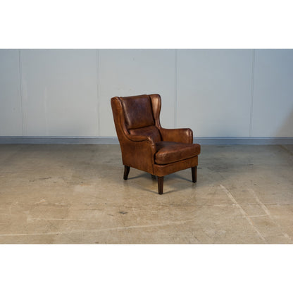 Elite Wing Lounge Chair by Sarreid Ltd.. Made from rubber wood, top grain cow leather in a rustic style.