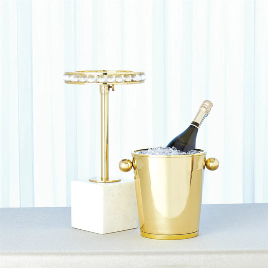 Margot Side Table by Global Views. Made from brass, marble, acrylic in a transitional style.