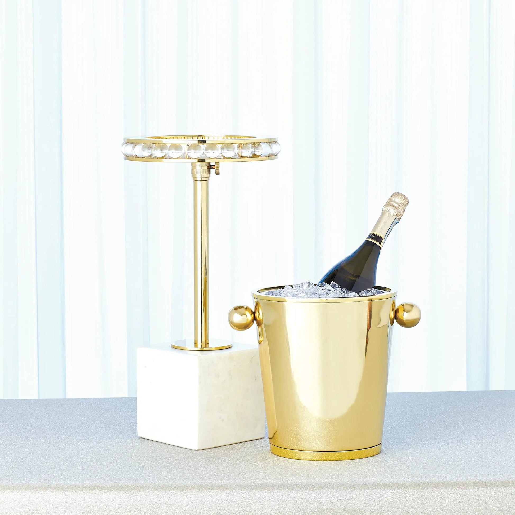 Margot Champagne Bucket by Global Views. Made from brass, stainless steel in a transitional style.