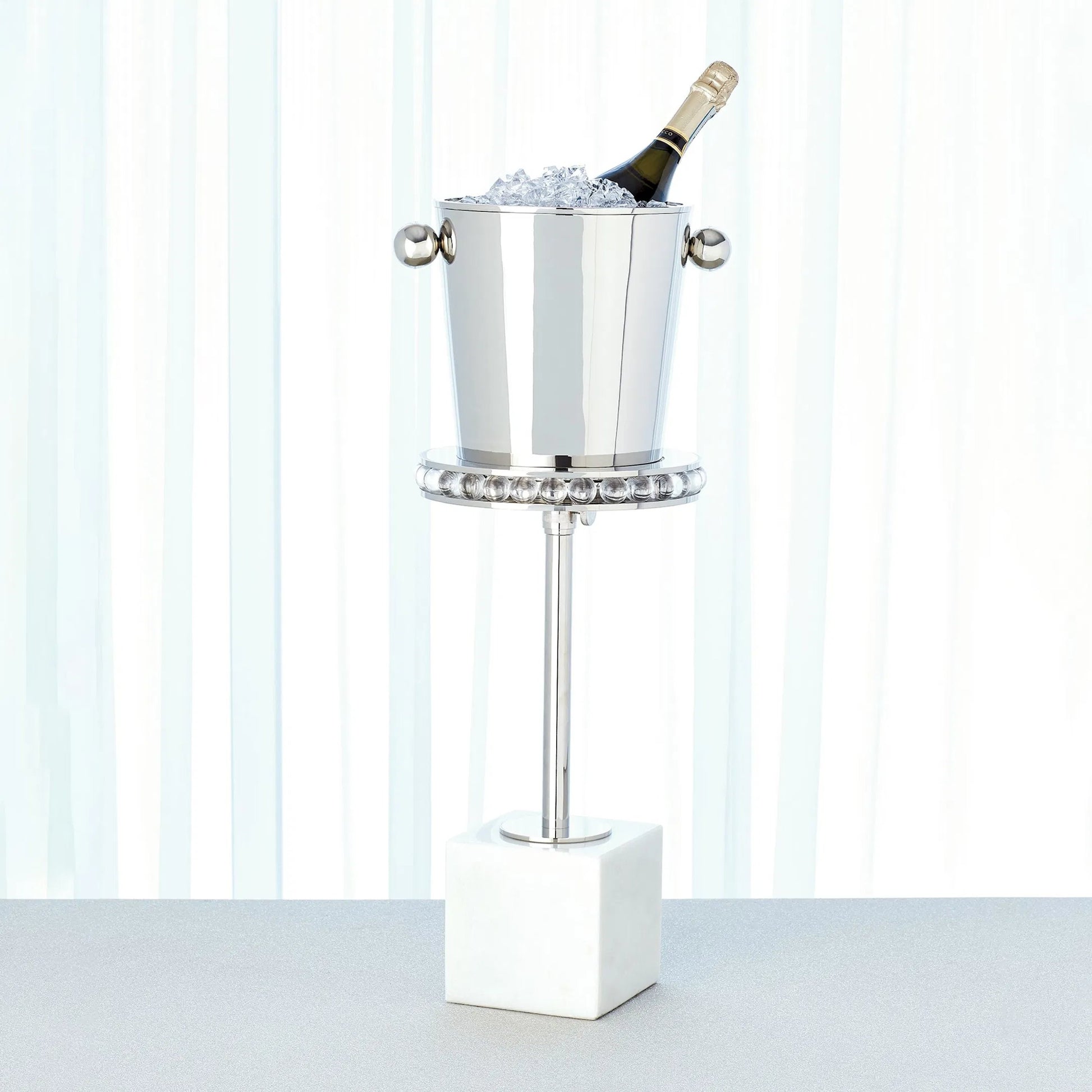 Margot Champagne Bucket by Global Views. Made from brass, stainless steel in a transitional style.