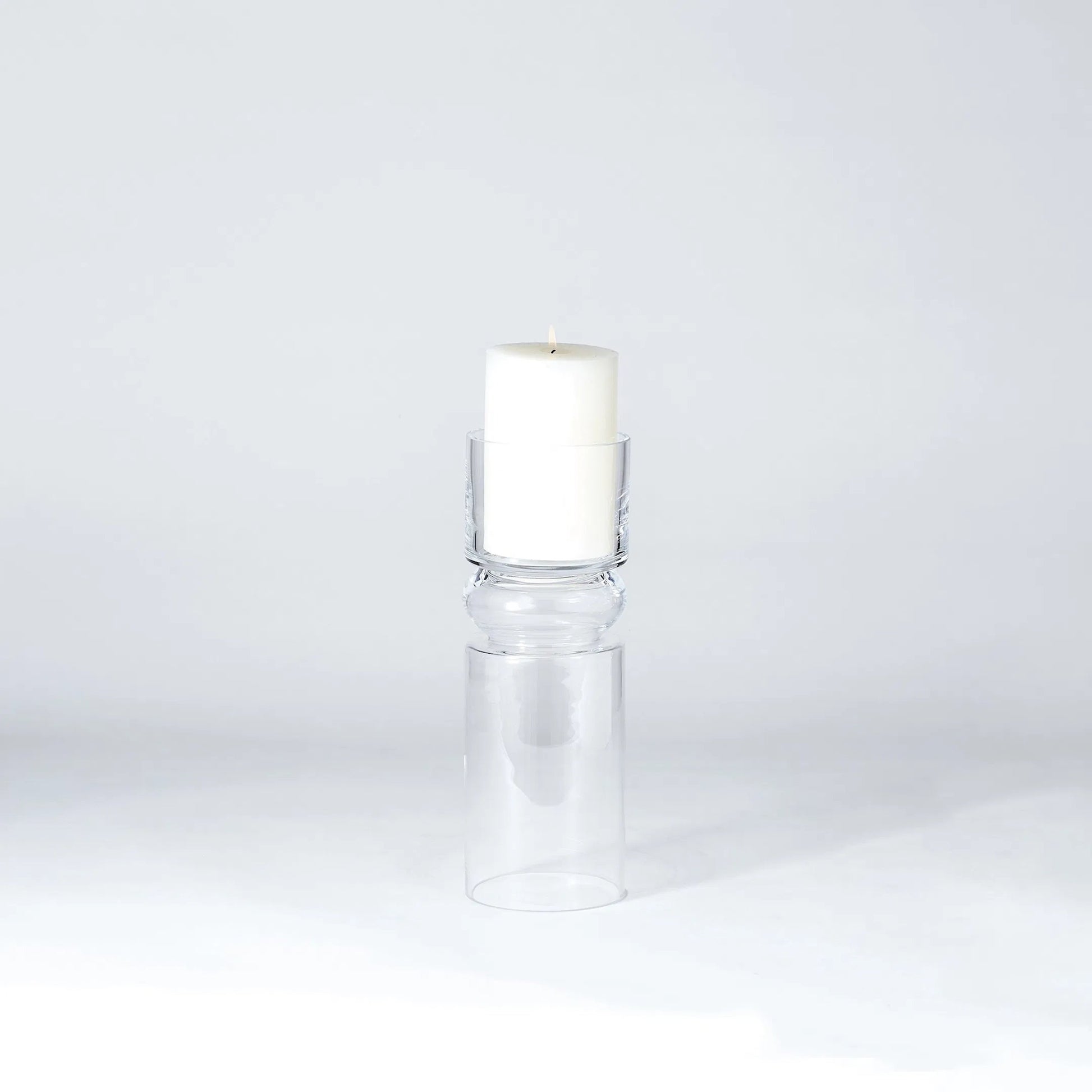 Flip Flop Candleholder Vase by Global Views. Made from glass in a transitional style.