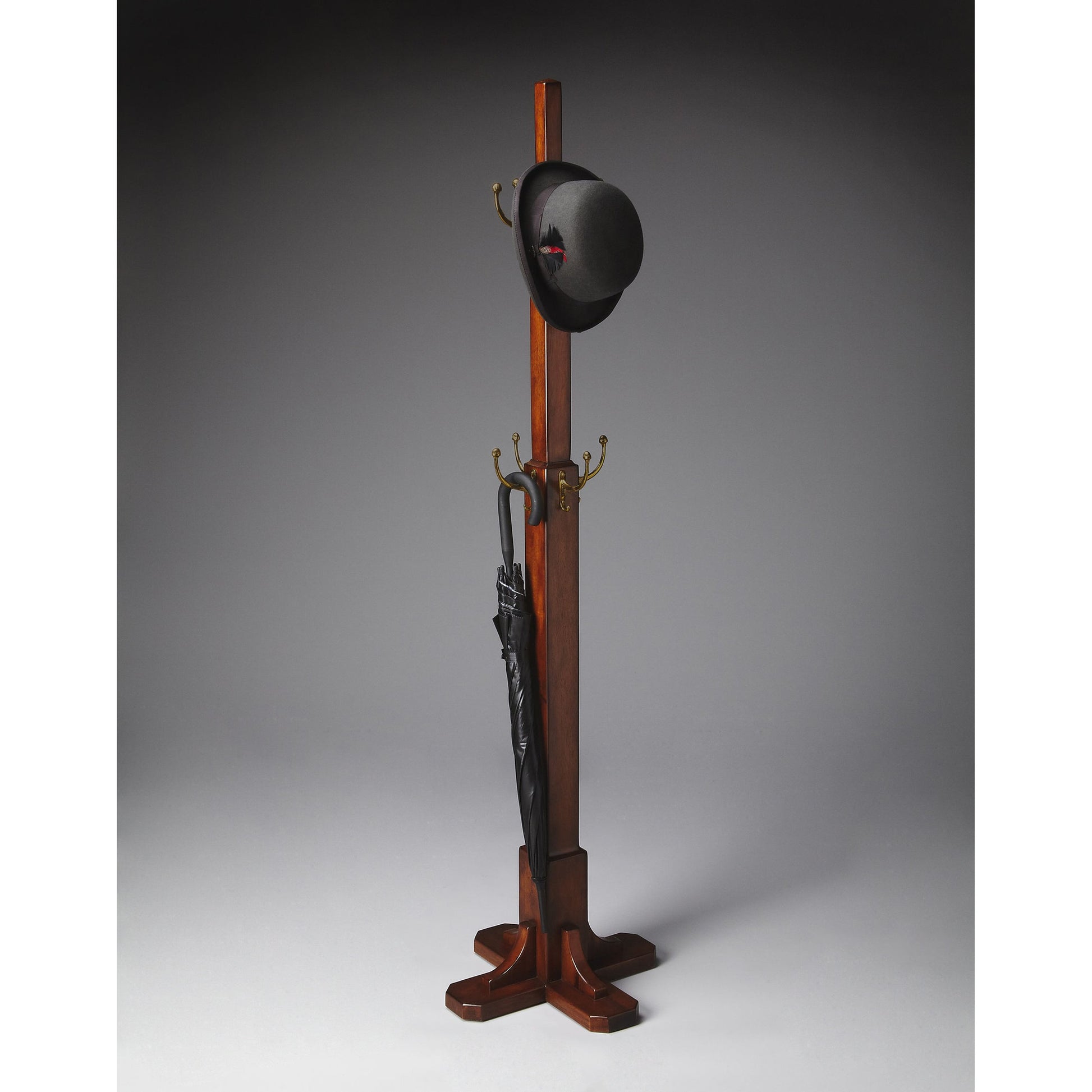 Webster Costumer by Butler Specialty Company. Made from rubberwood solids, antique brass hardware in a traditional style.