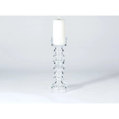 Glass Ribbed Candleholder by Global Views. Made from glass in a transitional style.