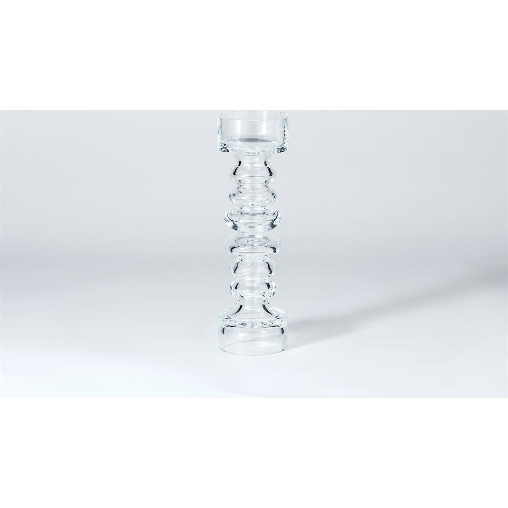 Glass Ribbed Candleholder by Global Views. Made from glass in a transitional style.