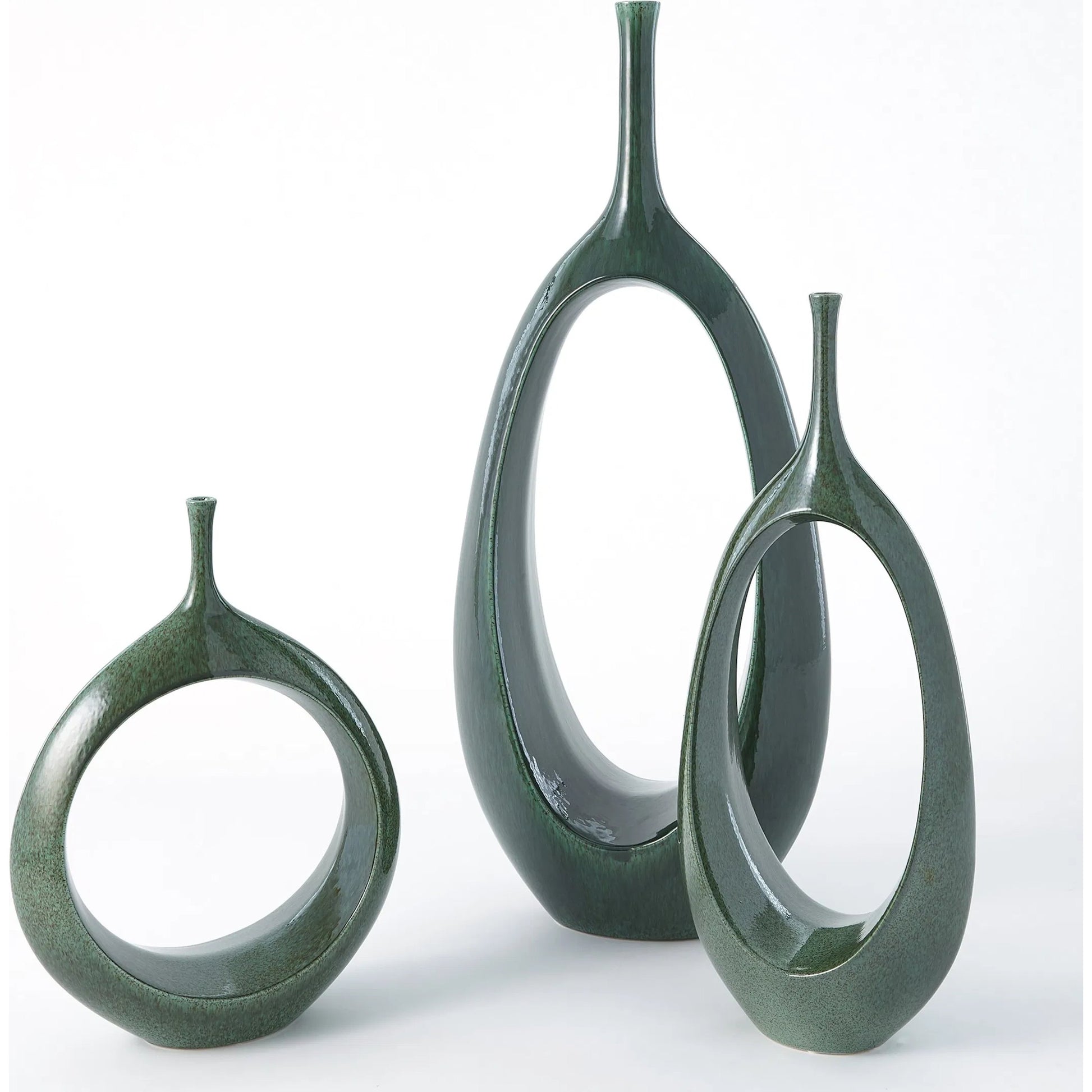 Open Ring Vase by Global Views. Made from ceramic in a eclectic & global style.