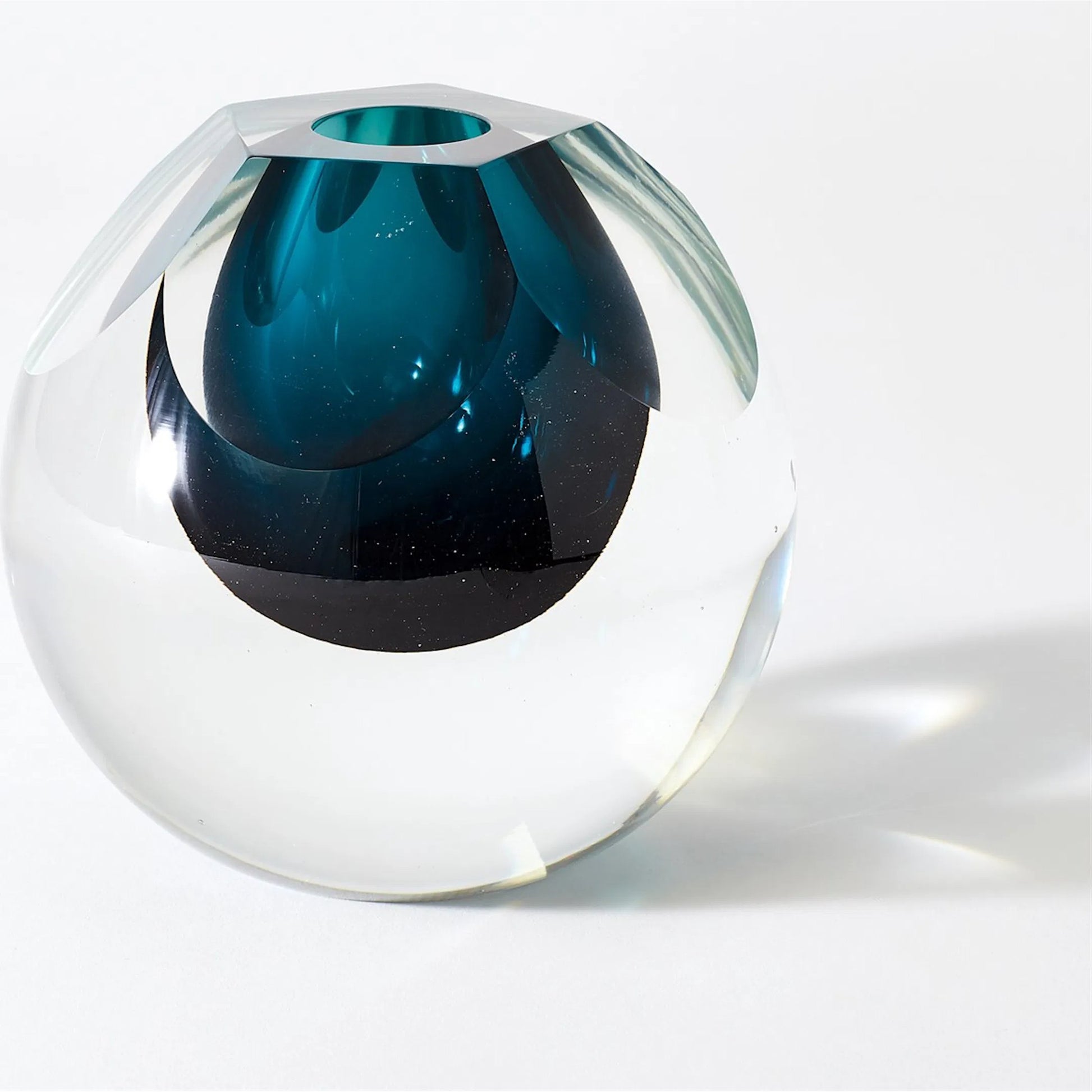 Square Cut Glass Vase by Global Views. Made from art glass in a coastal style.