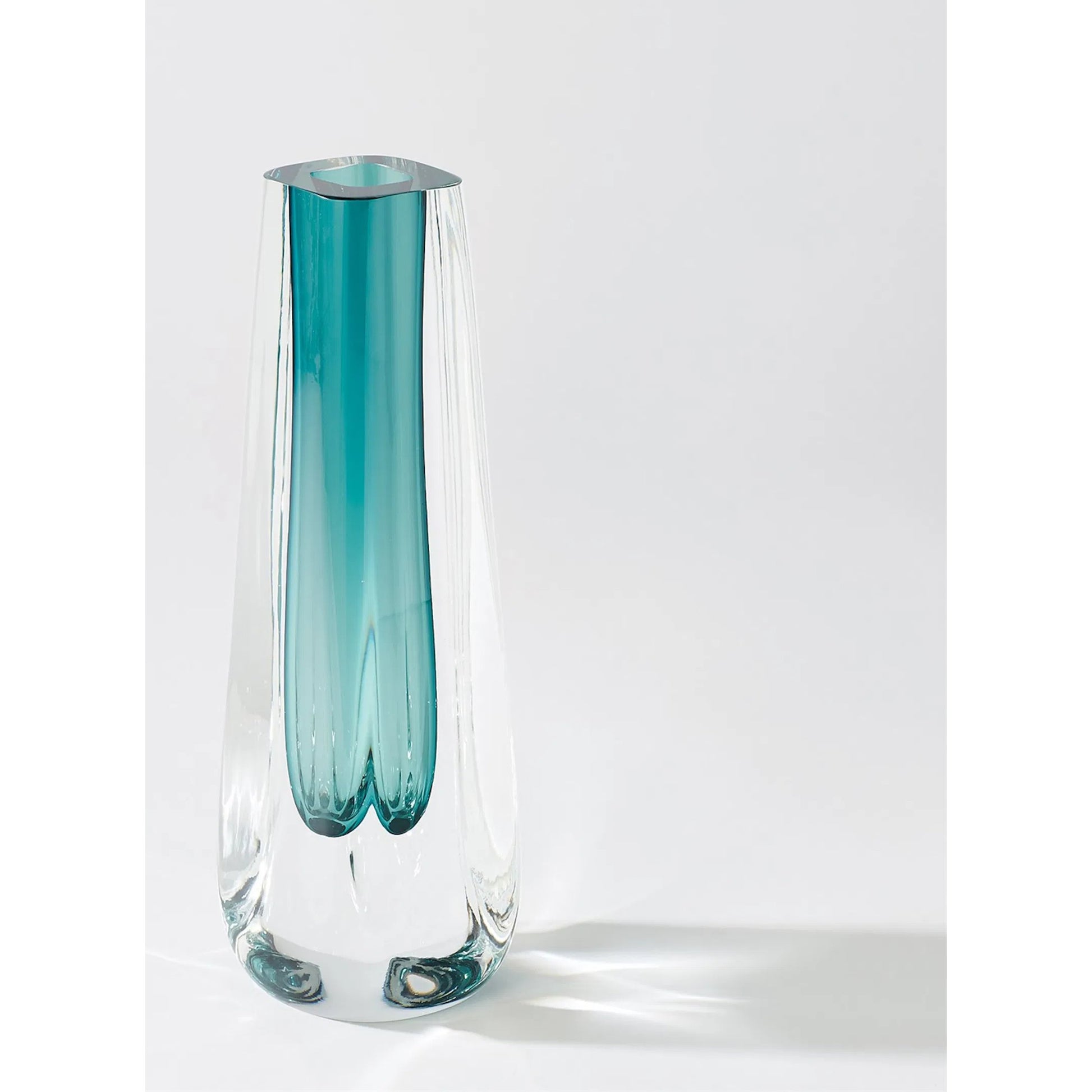 Square Cut Glass Vase by Global Views. Made from art glass in a coastal style.