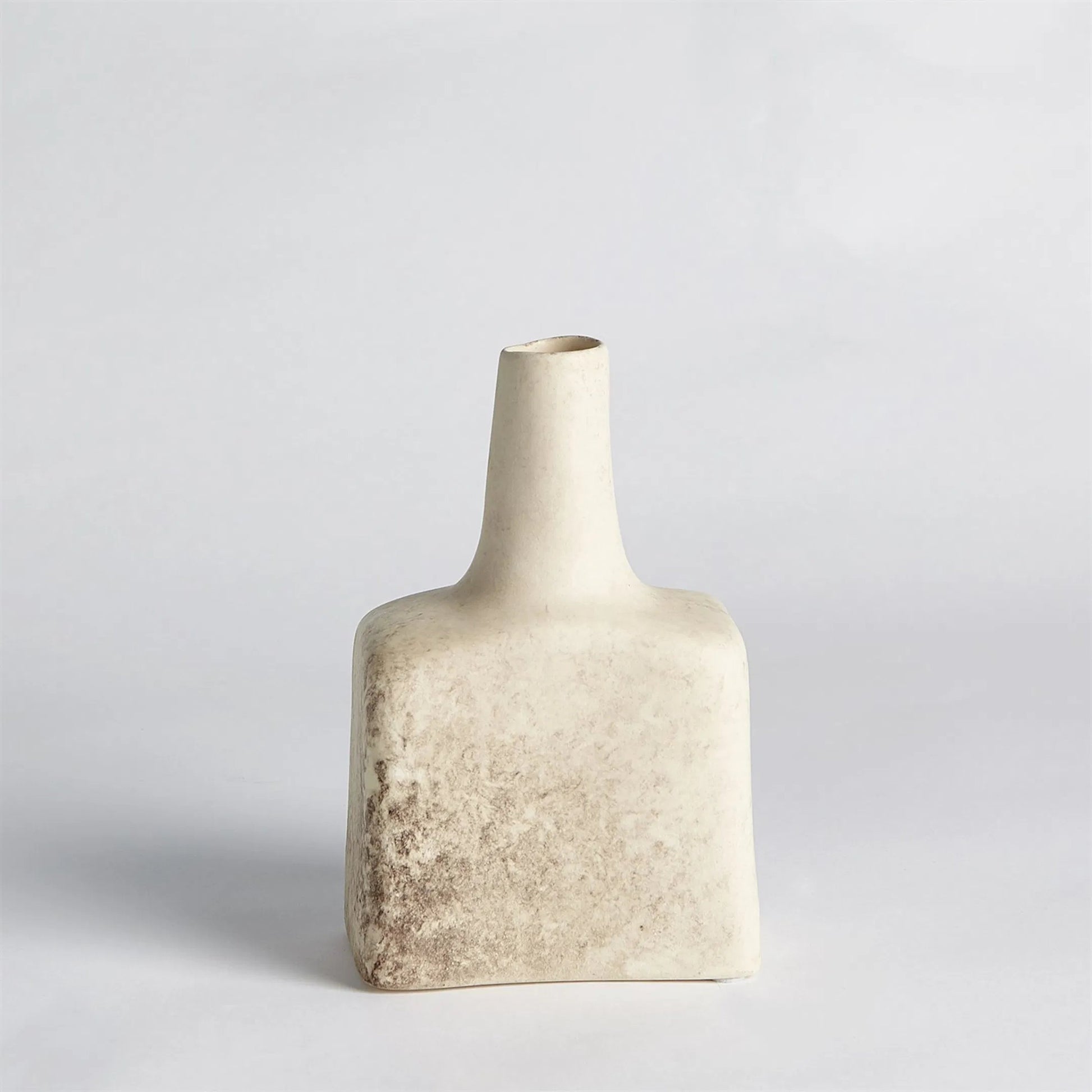 Tall Stack Bottle by Global Views in reactive ivory. Made from earthenware in a eclectic & global style.