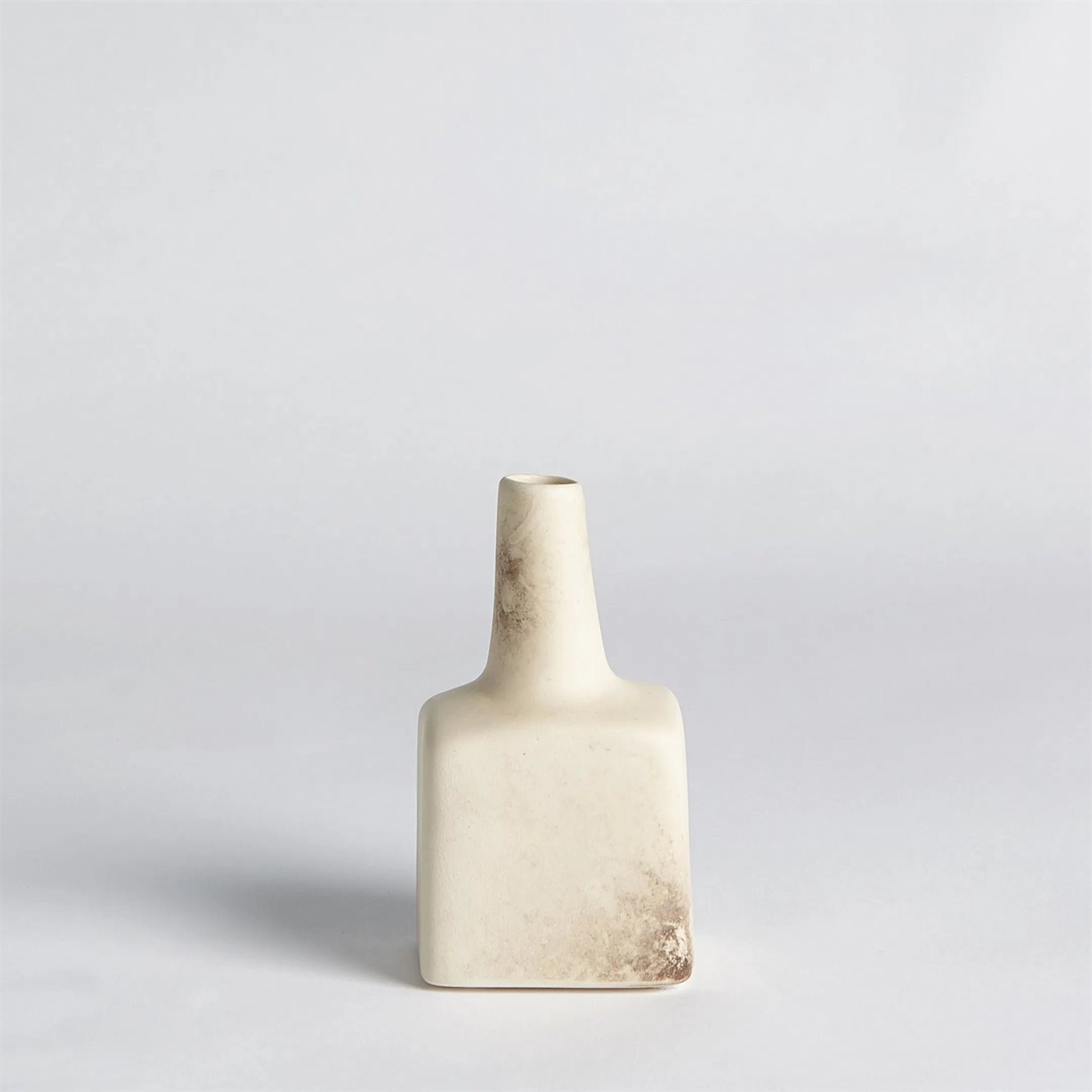 Tall Stack Bottle by Global Views in reactive ivory. Made from earthenware in a eclectic & global style.