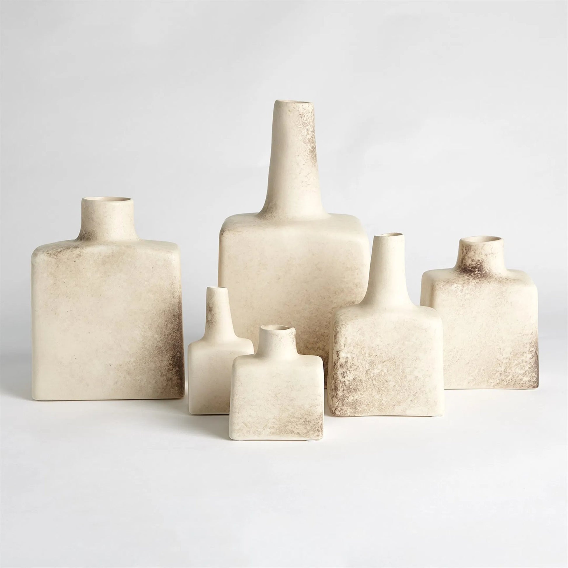 Tall Stack Bottle by Global Views in reactive ivory. Made from earthenware in a eclectic & global style.