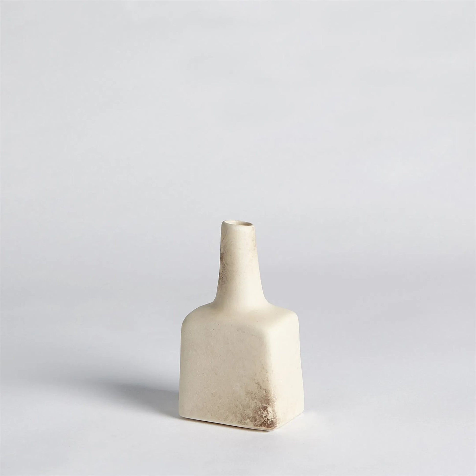 Tall Stack Bottle by Global Views in reactive ivory. Made from earthenware in a eclectic & global style.