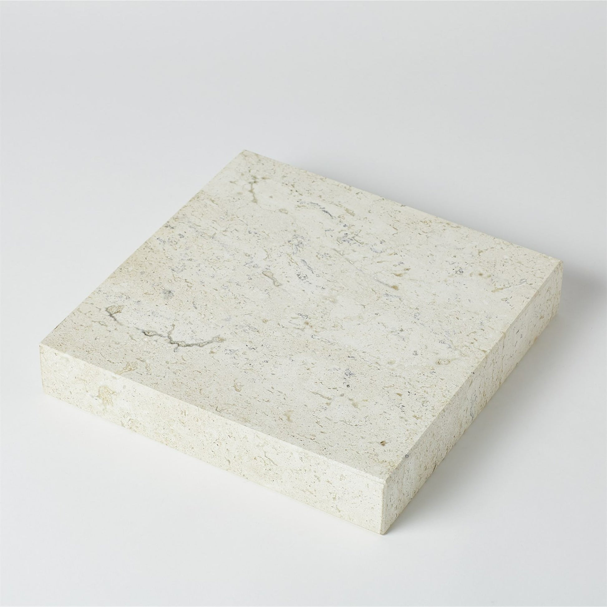 Travertine Cube Riser by Global Views. Made from travertine in a modern style.