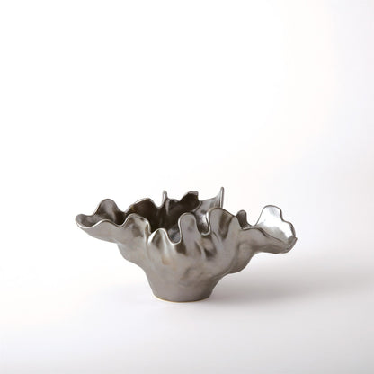 Meteor Bowl by Global Views. Made from ceramic in a coastal style.
