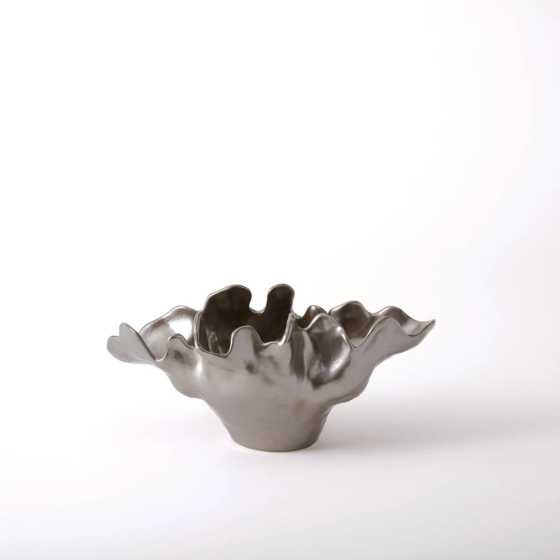 Meteor Bowl by Global Views. Made from ceramic in a coastal style.