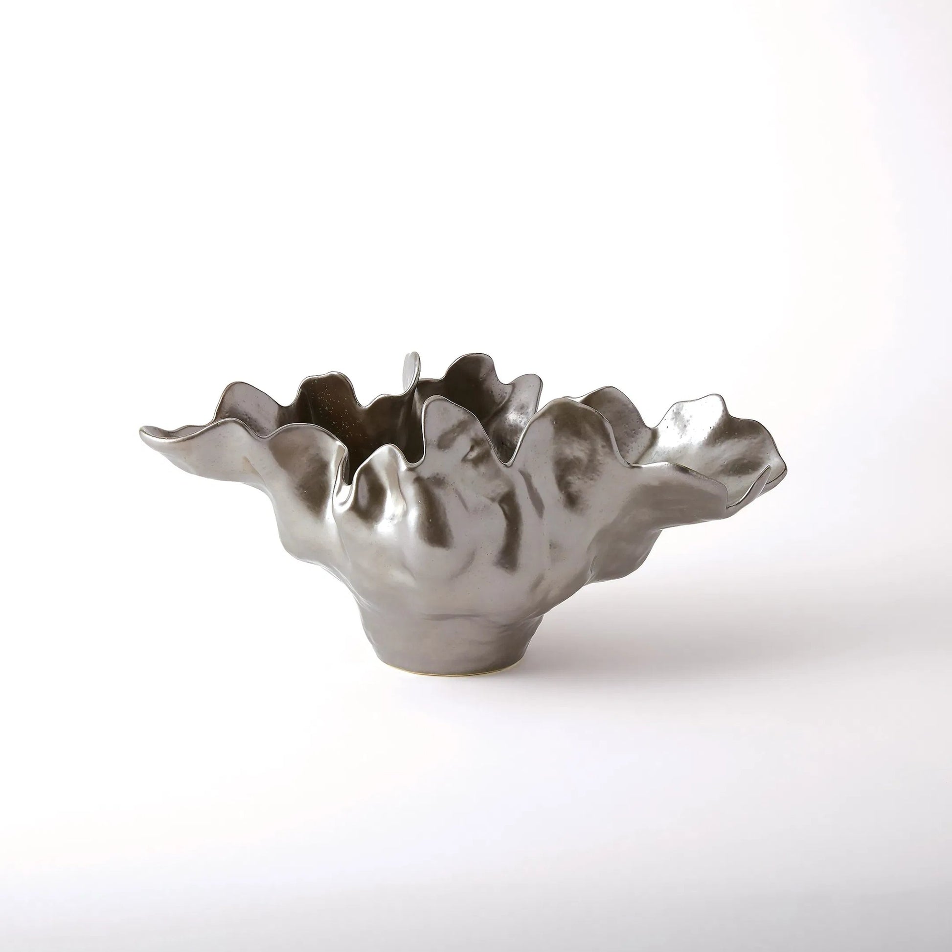 Meteor Bowl by Global Views. Made from ceramic in a coastal style.