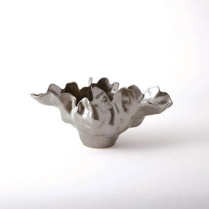 Meteor Bowl by Global Views. Made from ceramic in a coastal style.