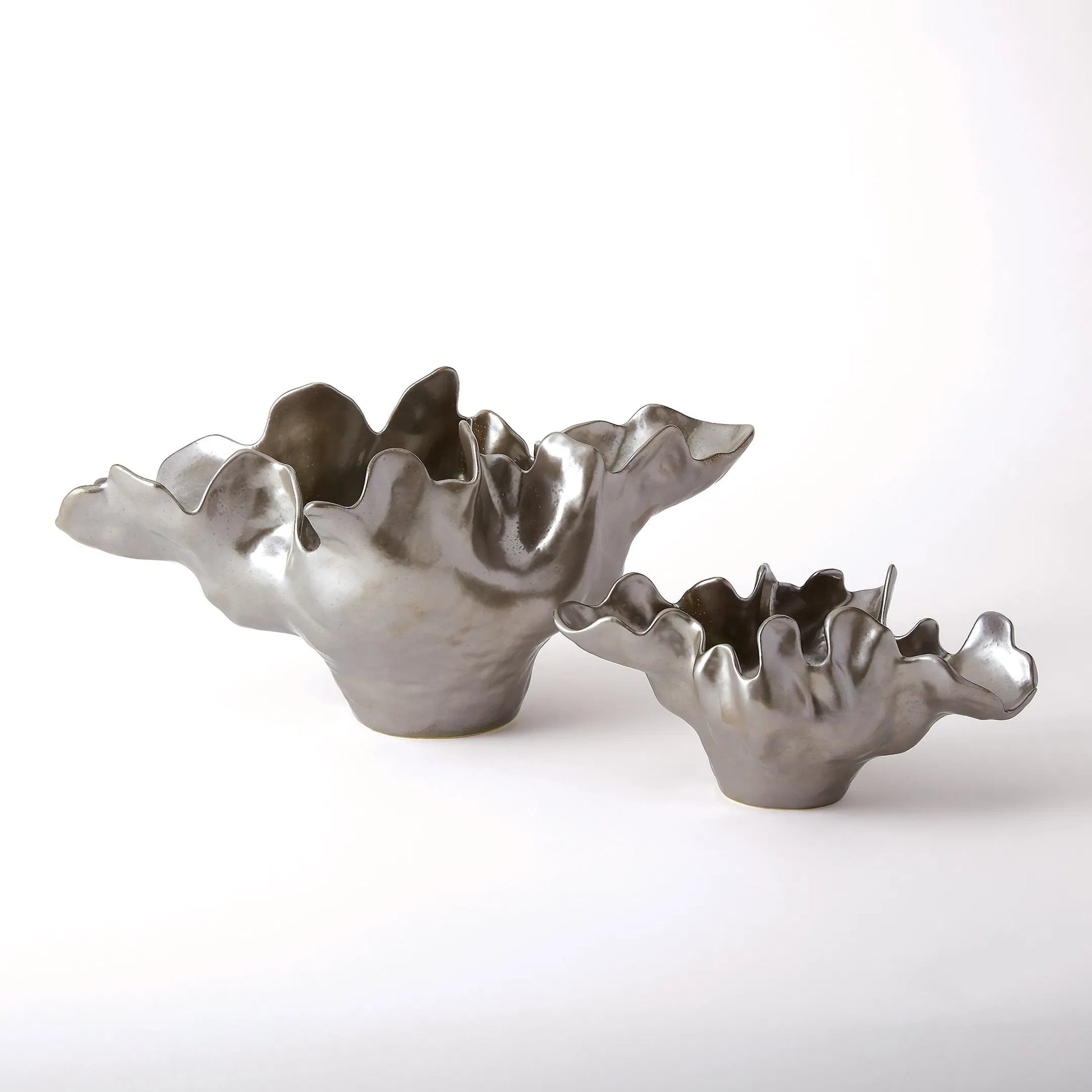 Meteor Bowl by Global Views. Made from ceramic in a coastal style.