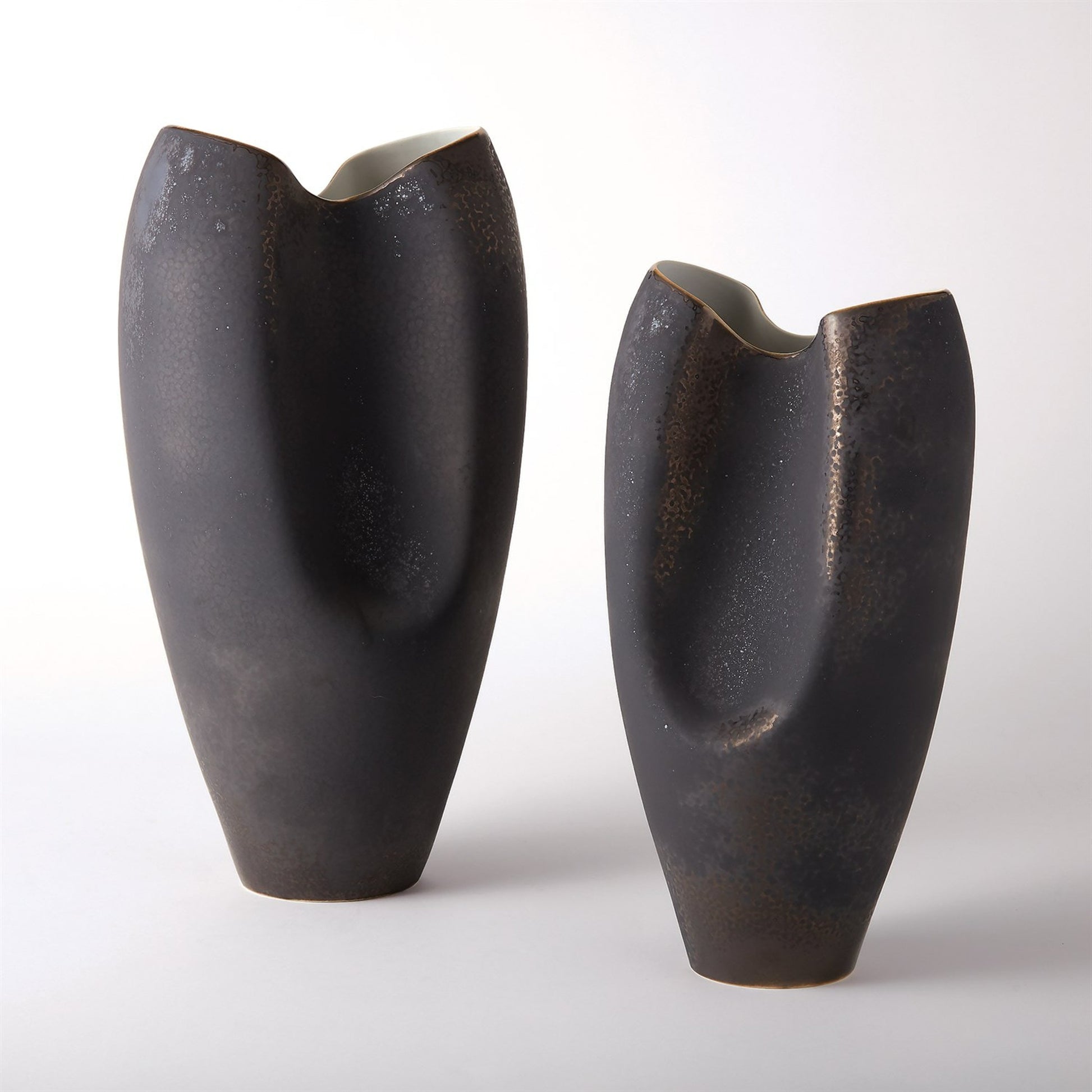 Oxus Pinched Vase by Global Views. Made from porcelain in a eclectic & global style.