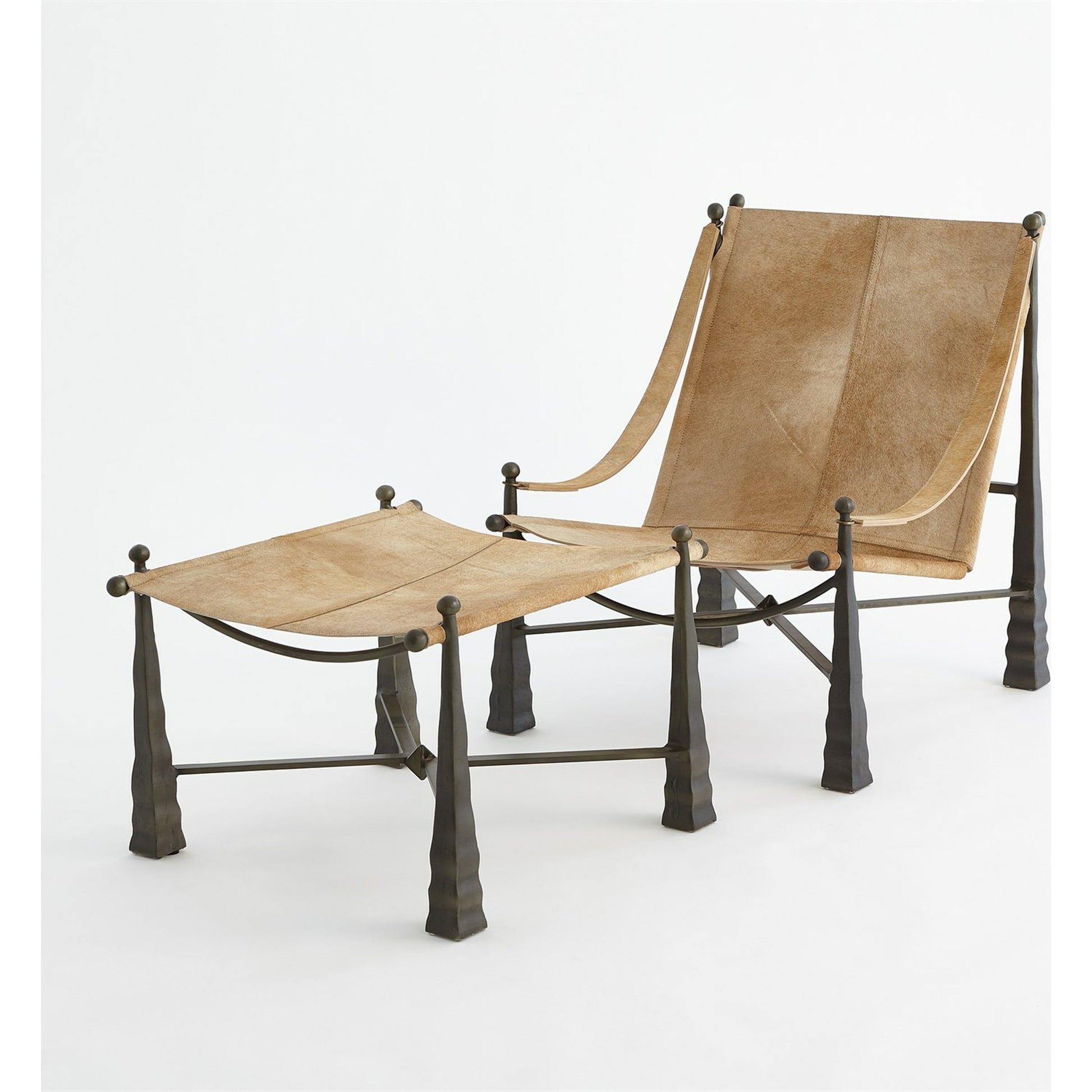 Cognac Ottoman by Global Views. Made from metal, cowhide in a rustic style.