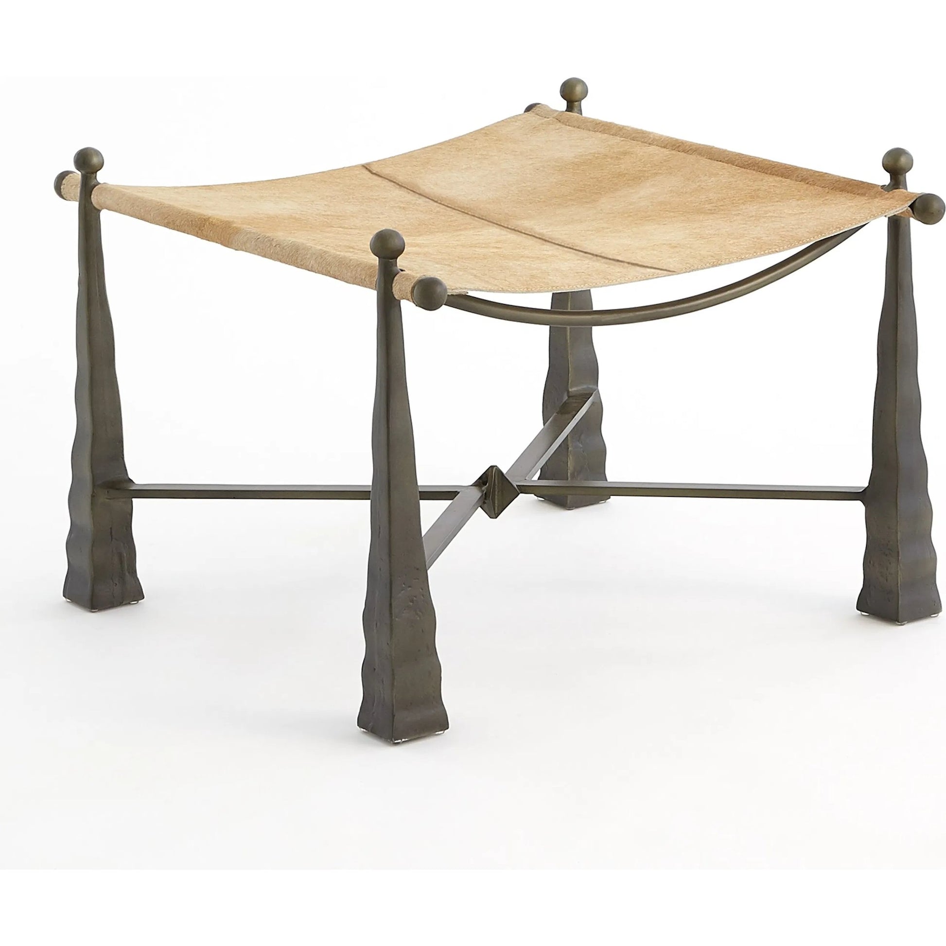 Cognac Ottoman by Global Views. Made from metal, cowhide in a rustic style.
