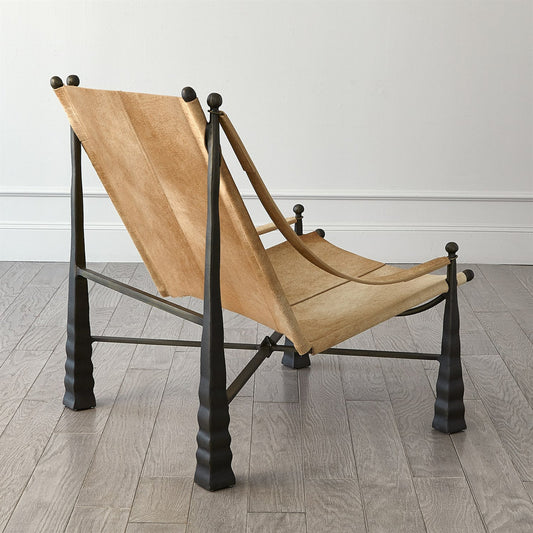 Cognac Ottoman by Global Views. Made from metal, cowhide in a rustic style.