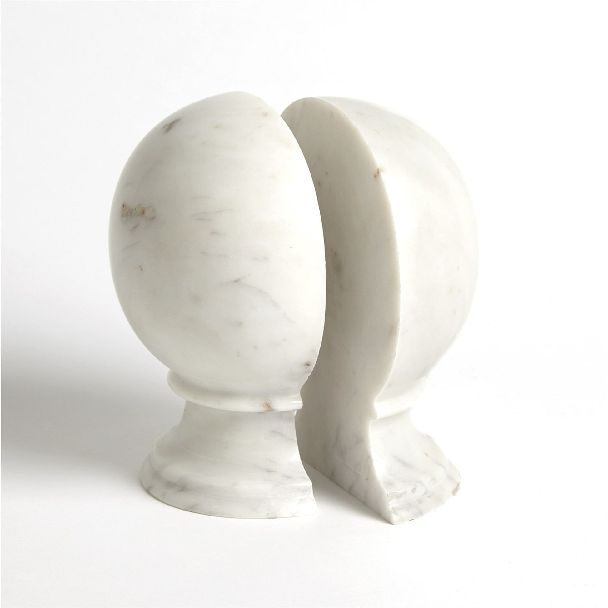 Marble Sphere Bookends by Global Views. Made from marble in a transitional style.