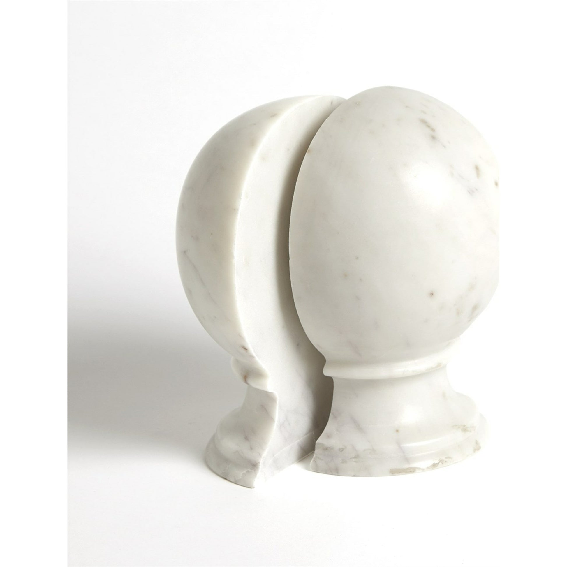 Marble Sphere Bookends by Global Views. Made from marble in a transitional style.