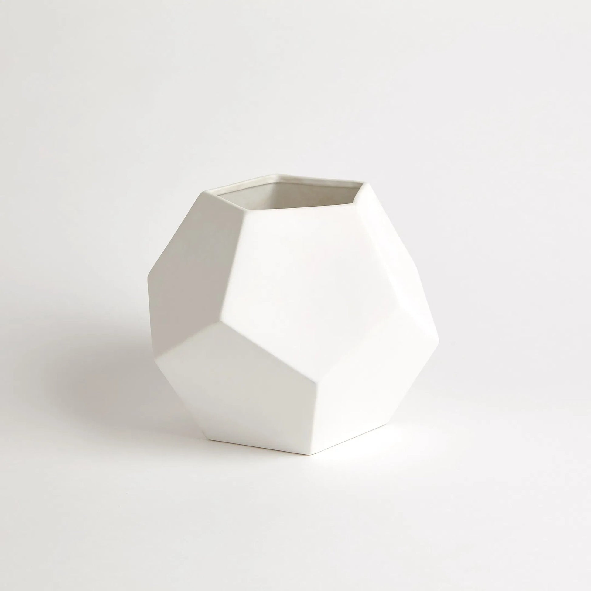 Faceted Vase by Global Views. Made from ceramic in a modern style.