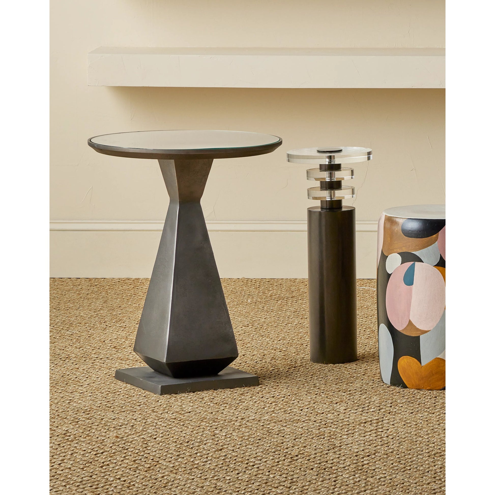 Janil Accent Table by Currey and Company in graphite, clear. Made from cast aluminum, glass in a modern style.