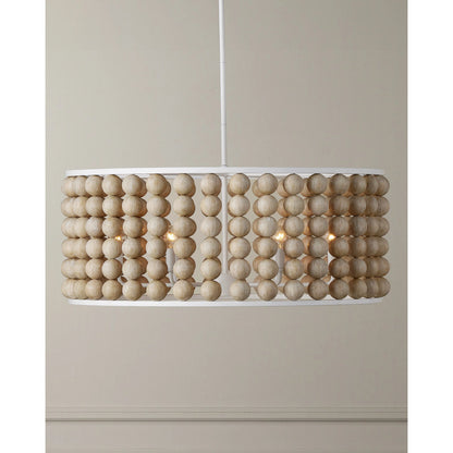 Holcroft Chandelier by Currey and Company in sandstone, sugar white. Made from wood beads, wrought iron in a modern style.