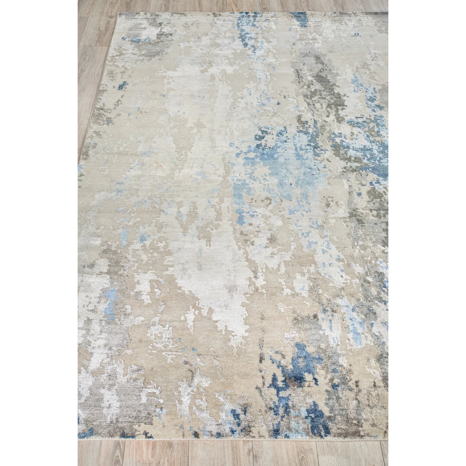 Cosmo 4343 Rug by Exquisite Rugs in silver, blue, ivory. Made from wool, bamboo silk in a unique style.
