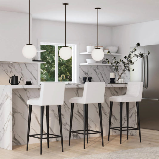 Maxwell Leather Bar Stool by Butler Specialty Company in white. Made from iron, goat leather, foam, engineered wood in a unique style.