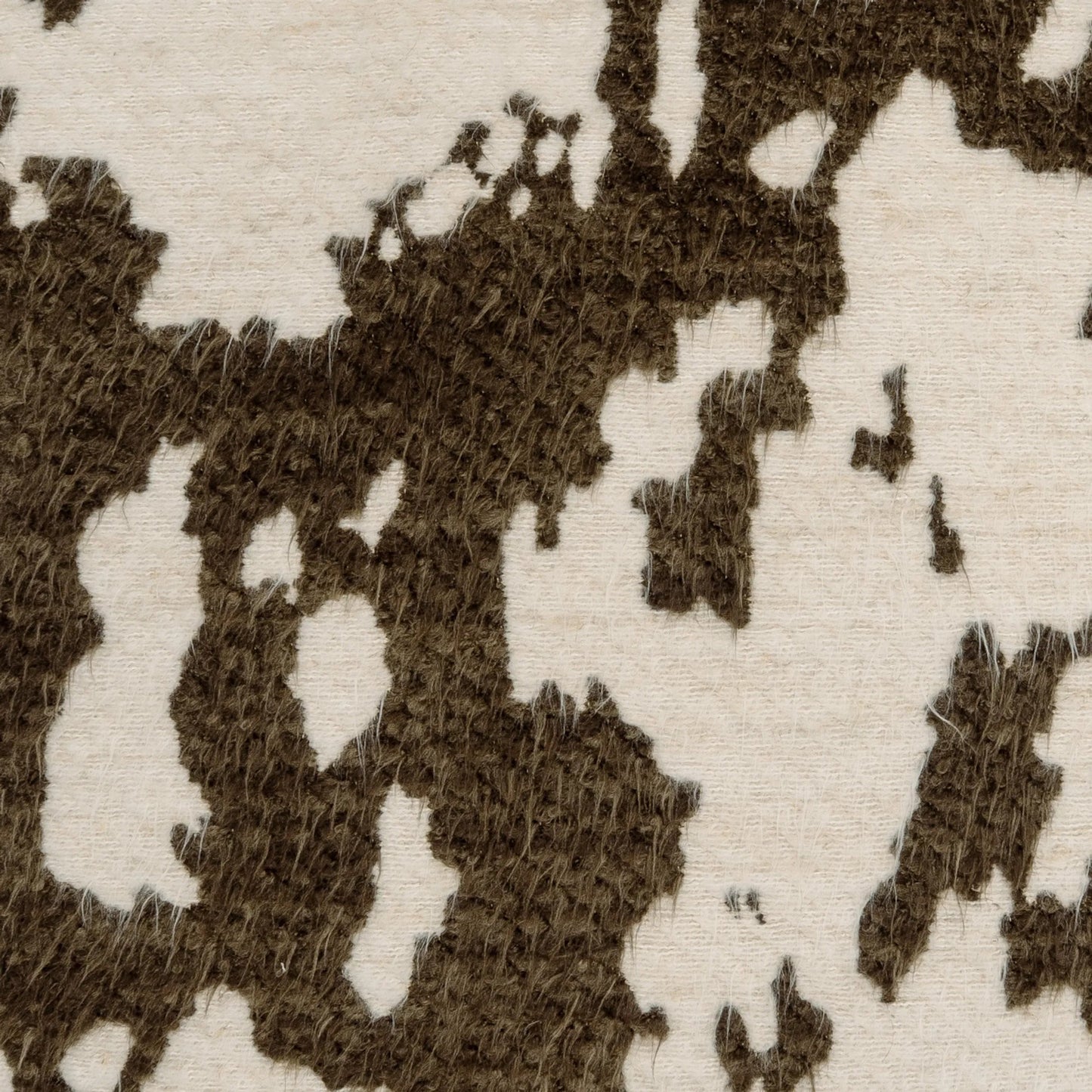 002 SI-2514390 | Closeup | Heidi Pillow by DV Kap Home in brown. Made from 11% cotton, 53% polyacrylic, 34% polyester, 2% linen in a unique style.