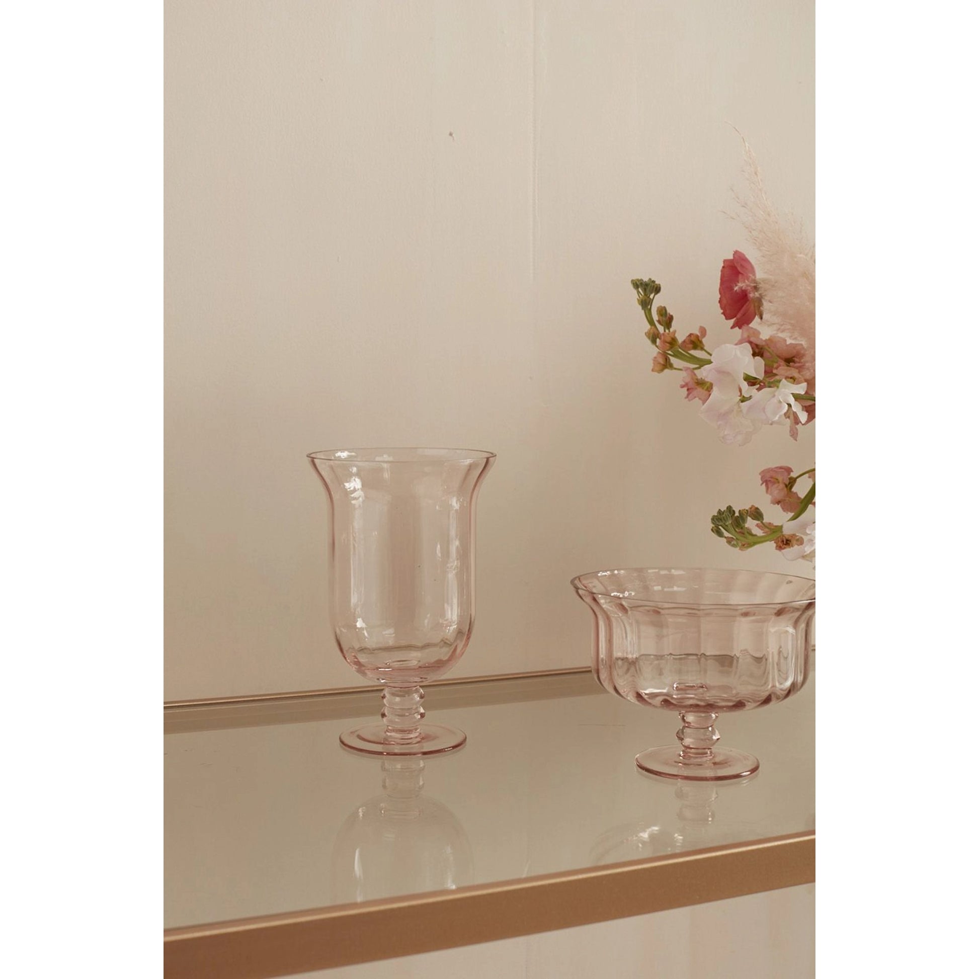 Vesna Footed Vase by Accent Decor in pink. Made from glass in a modern style.