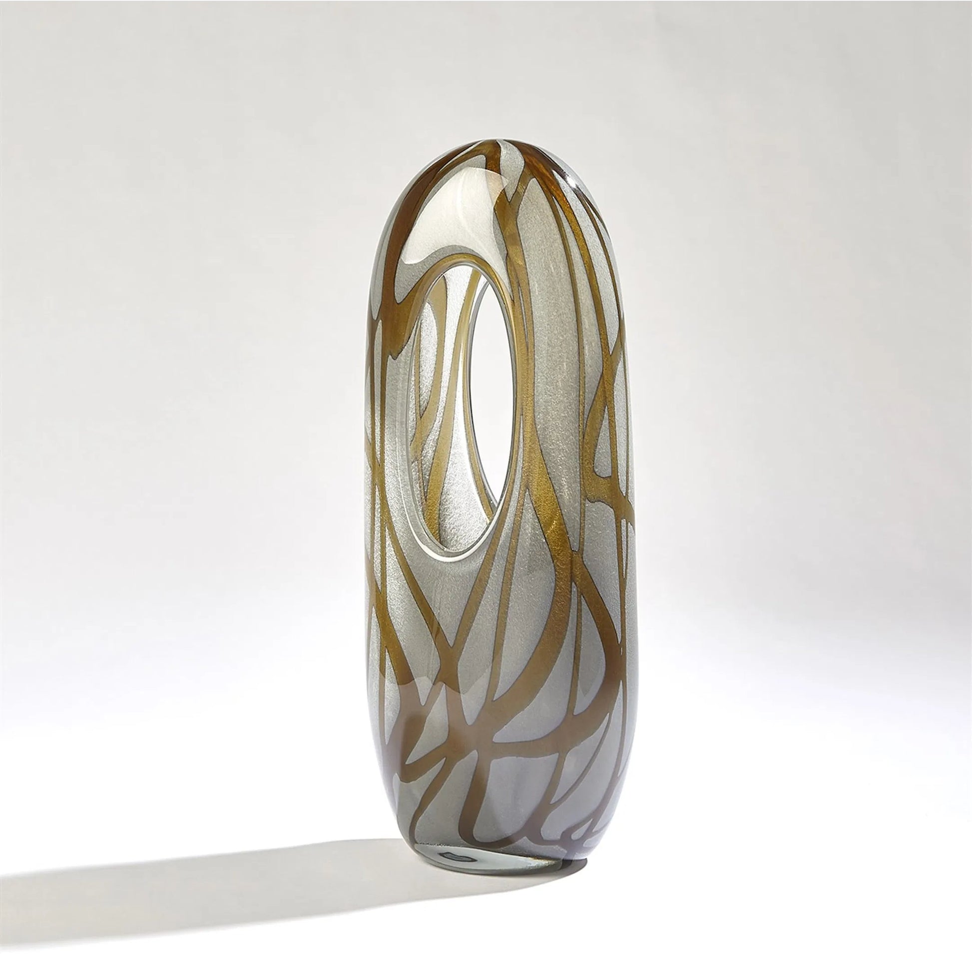 Swirl Vase by Global Views in amber, gray. Made from art glass in a modern style.