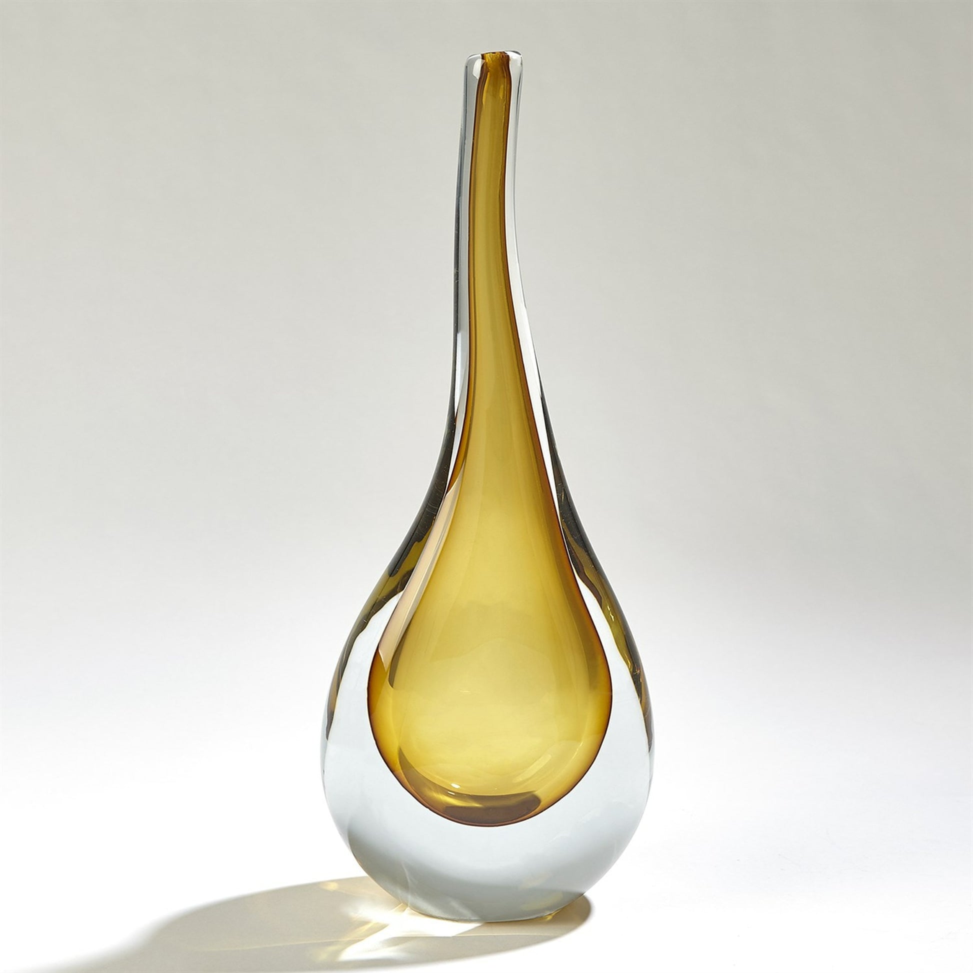 Stretched Neck Vase by Global Views. Made from art glass in a modern style.
