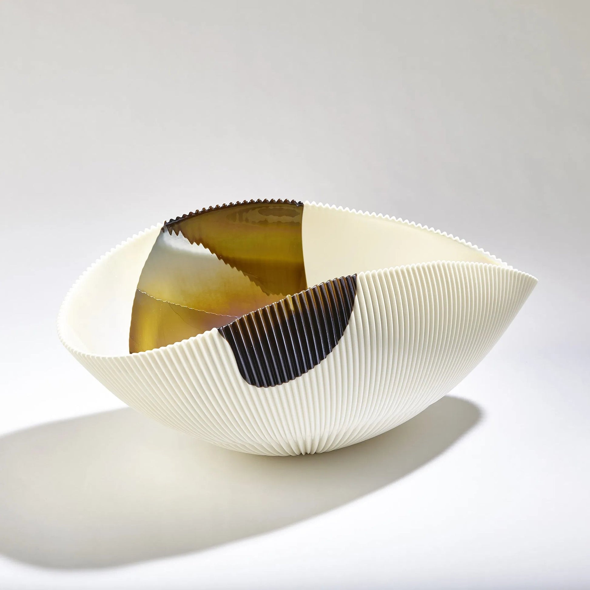 Pleated Bronze Stripe Bowl by Global Views in bronze stripe. Made from artglass in a modern style.