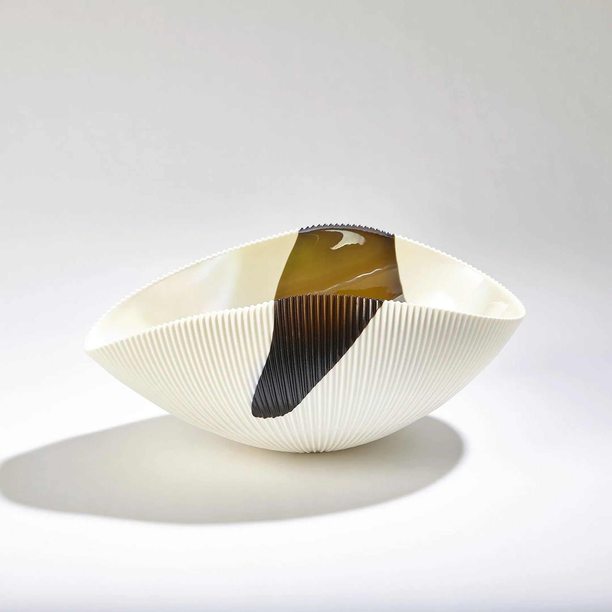 Pleated Bronze Stripe Bowl by Global Views in bronze stripe. Made from artglass in a modern style.