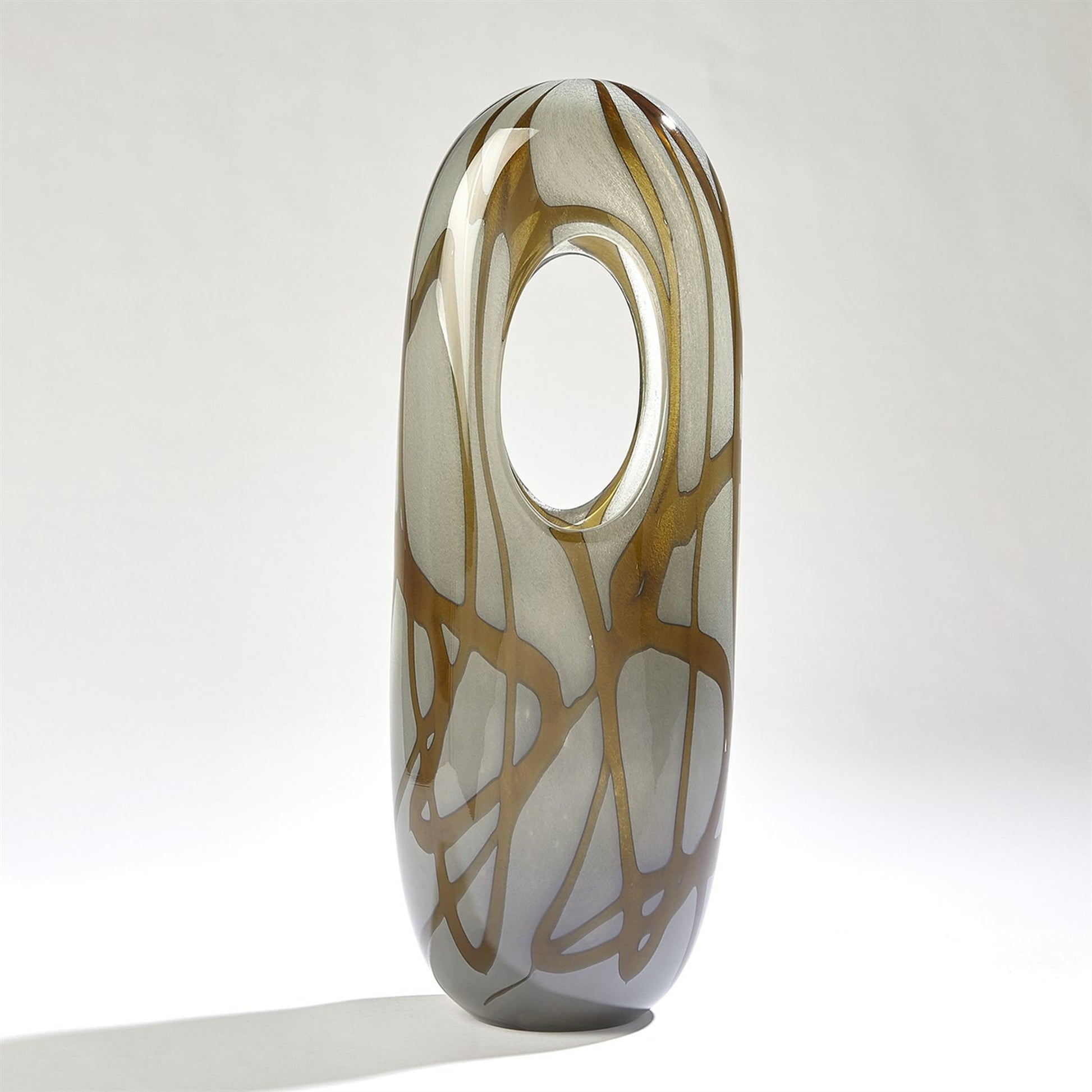 Swirl Vase by Global Views in amber, gray. Made from art glass in a modern style.